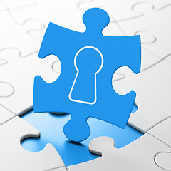 Image showing Information concept: Keyhole on puzzle background