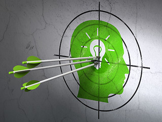 Image showing Business concept: arrows in Head With Light Bulb target on wall background