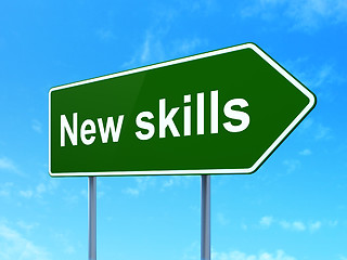 Image showing Education concept: New Skills on road sign background