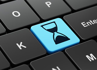 Image showing Time concept: Hourglass on computer keyboard background