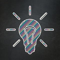 Image showing Business concept: Light Bulb on chalkboard background