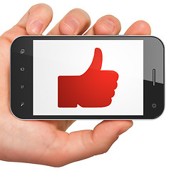 Image showing Social media concept: Thumb Up on smartphone