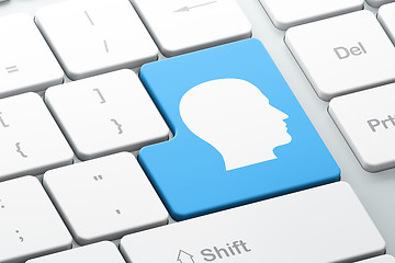 Image showing Advertising concept: Head on computer keyboard background