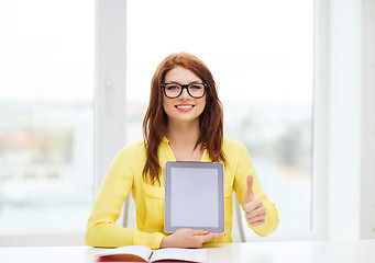 Image showing smiling student girl in eyelgasses with tablet pc