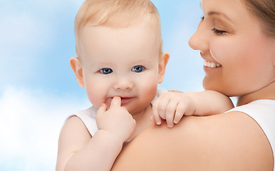 Image showing happy mother with adorable baby