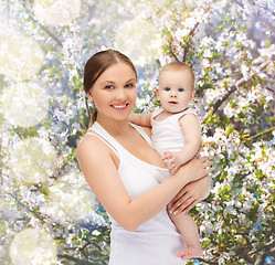 Image showing happy mother with adorable baby