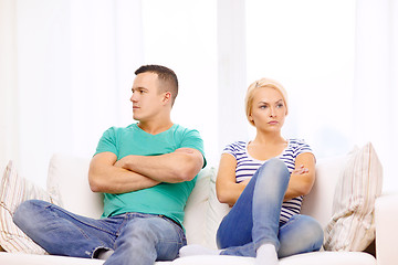 Image showing unhappy couple having argument at home