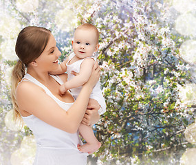 Image showing happy mother with adorable baby