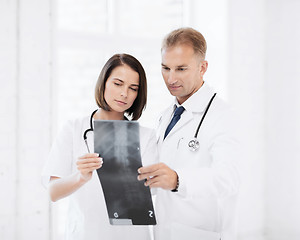 Image showing two doctors looking at x-ray