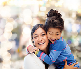 Image showing hugging mother and daughter