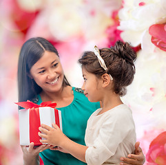 Image showing happy mother and child girl with gift box