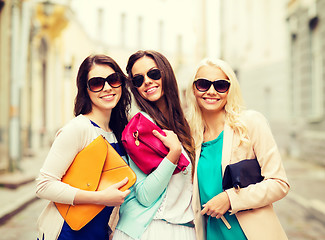 Image showing beautiful girls with bags in the ctiy