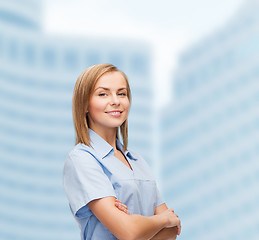 Image showing smiling female doctor or nurse