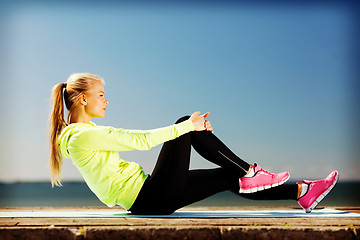 Image showing woman doing sports outdoors