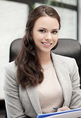 Image showing happy woman with documents