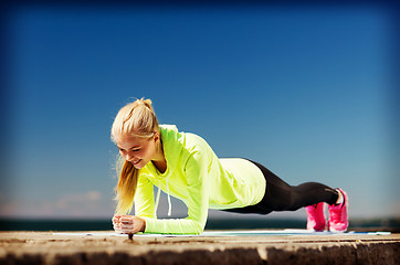 Image showing woman doing sports outdoors