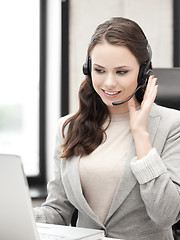 Image showing friendly female helpline operator