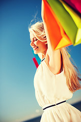 Image showing woman with shopping bags