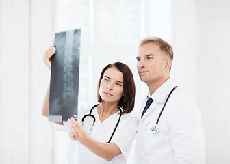 Image showing two doctors looking at x-ray