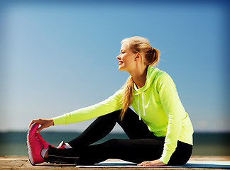 Image showing woman doing sports outdoors