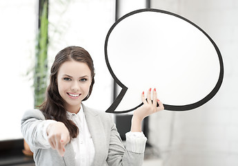 Image showing smiling businesswoman with blank text bubble