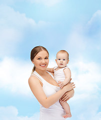 Image showing happy mother with adorable baby