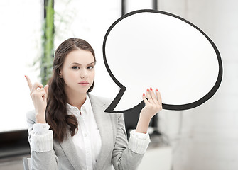 Image showing businesswoman holding blank text bubble