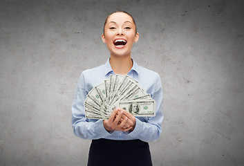 Image showing young businesswoman with dollar cash money