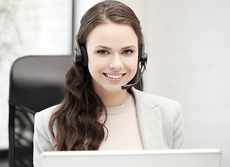 Image showing friendly female helpline operator