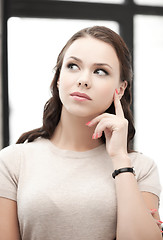 Image showing calm and serious thinking woman