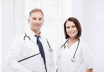 Image showing two doctors with stethoscopes