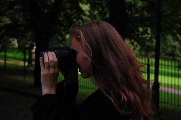 Image showing Woman taking a photo