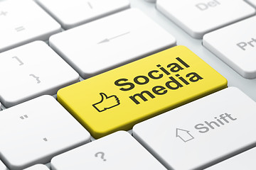 Image showing Social network concept: Thumb Up and Social Media on computer keyboard background