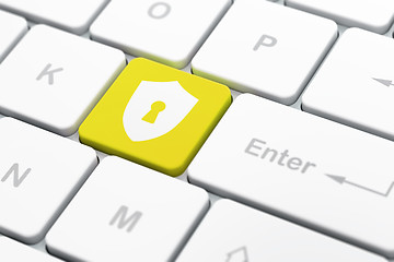 Image showing Safety concept: Shield With Keyhole on computer keyboard background