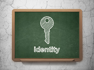 Image showing Safety concept: Key and Identity on chalkboard background
