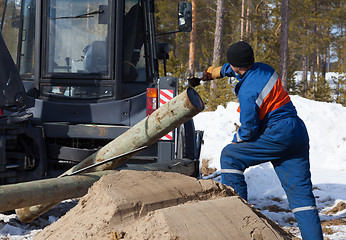 Image showing Processing wooden pylon 