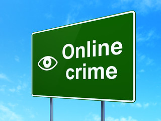 Image showing Security concept: Online Crime and Eye on road sign background
