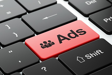 Image showing Advertising concept: Business People and Ads on computer keyboard background