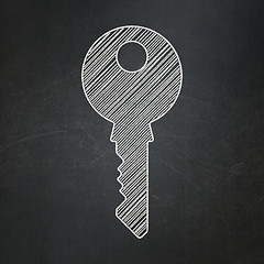 Image showing Protection concept: Key on chalkboard background