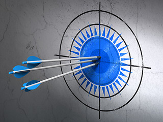 Image showing Travel concept: arrows in Sun target on wall background