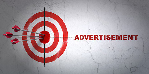 Image showing Advertising concept: target and Advertisement on wall background