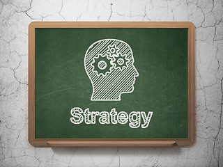 Image showing Business concept: Head With Gears and Strategy on chalkboard background