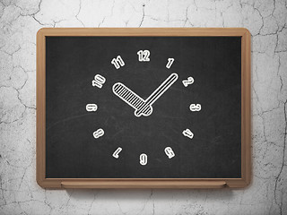 Image showing Time concept: Clock on chalkboard background