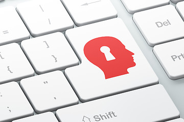 Image showing Protection concept: Head With Keyhole on computer keyboard background