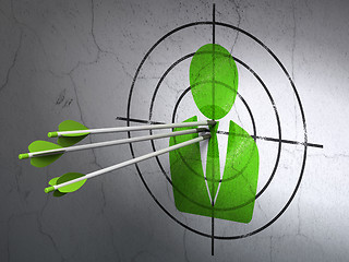 Image showing Business concept: arrows in Business Man target on wall background