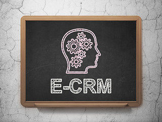 Image showing Finance concept: Head With Gears and E-CRM on chalkboard background