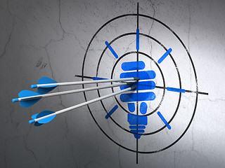 Image showing Business concept: arrows in Energy Saving Lamp target on wall background