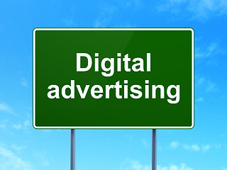 Image showing Marketing concept: Digital Advertising on road sign background