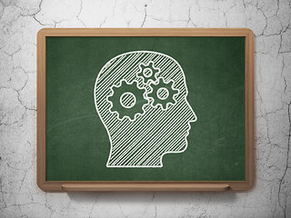 Image showing Marketing concept: Head With Gears on chalkboard background