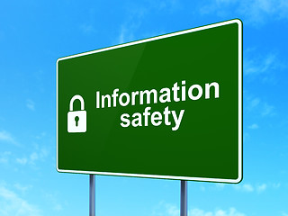 Image showing Safety concept: Information Safety and Closed Padlock on road sign background